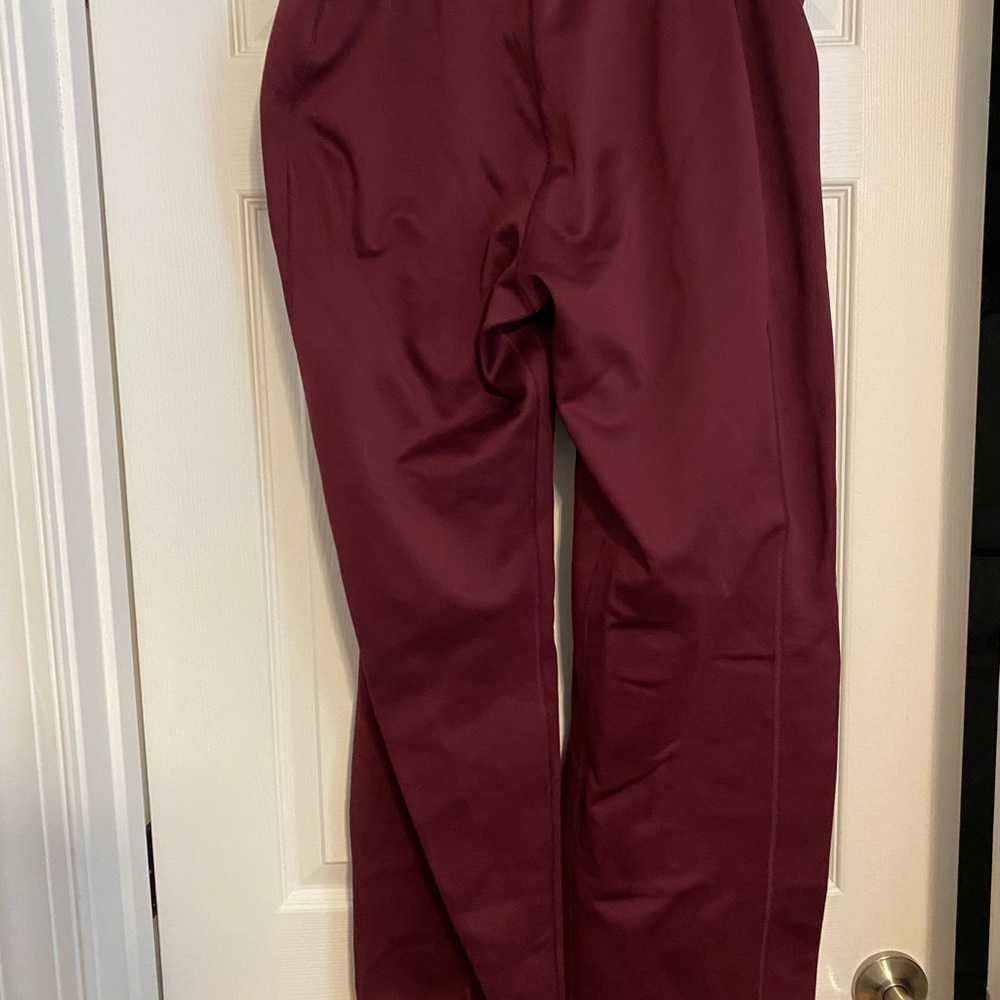Nike. Maroon sweat pants. Size large